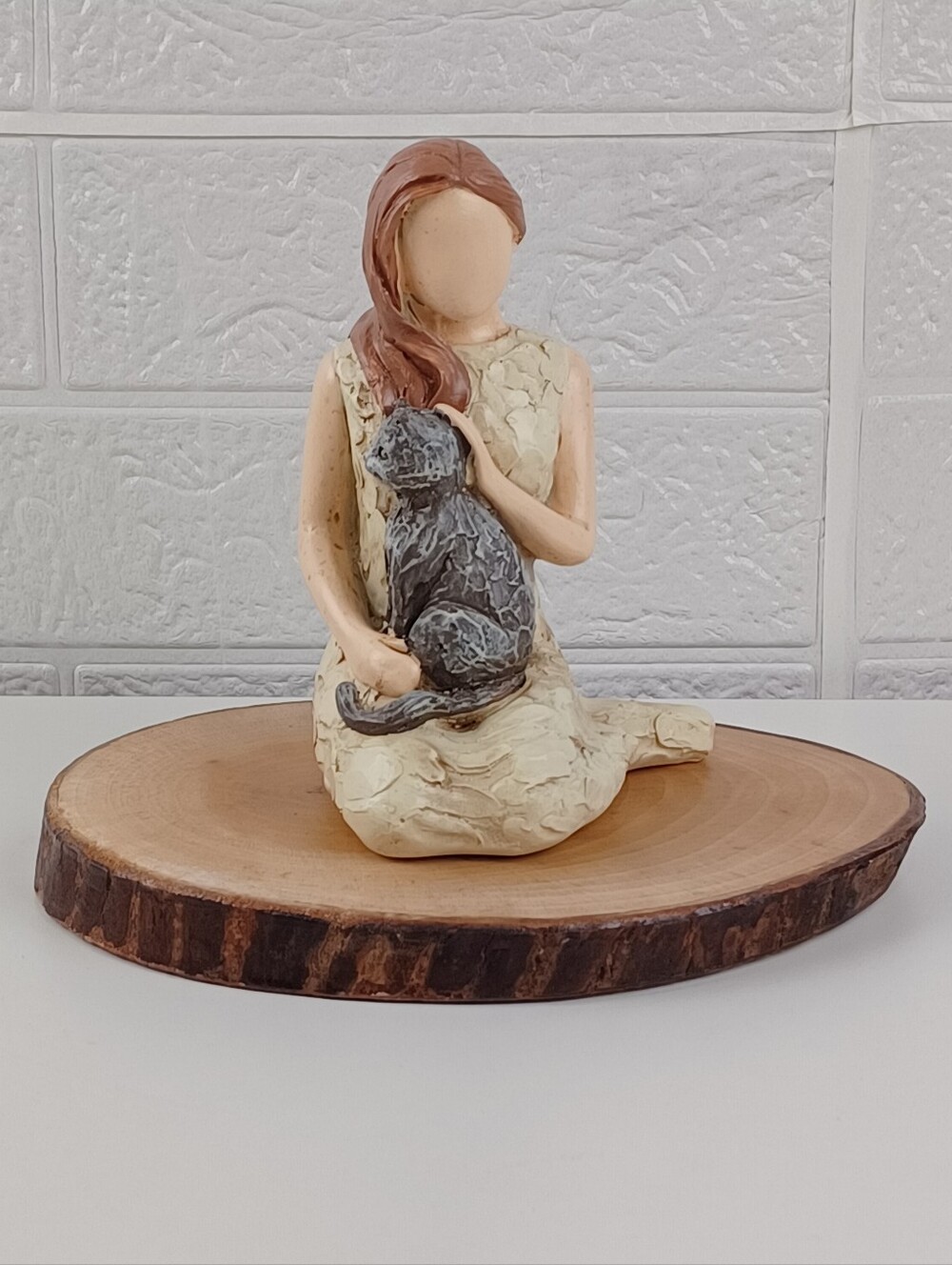 Cream Figurine of Woman with Gray Cat Home Accent